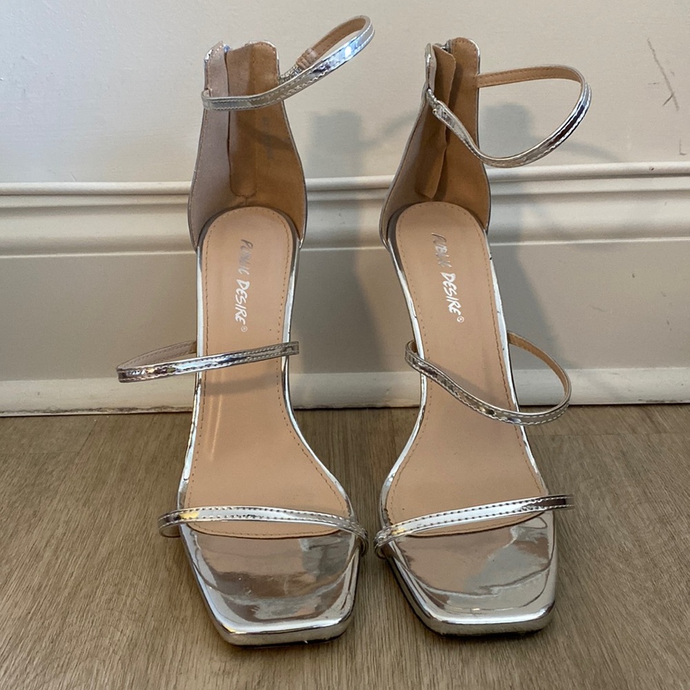 PUBLIC DESIRE 3 straps silver patent leather heels with square toes.